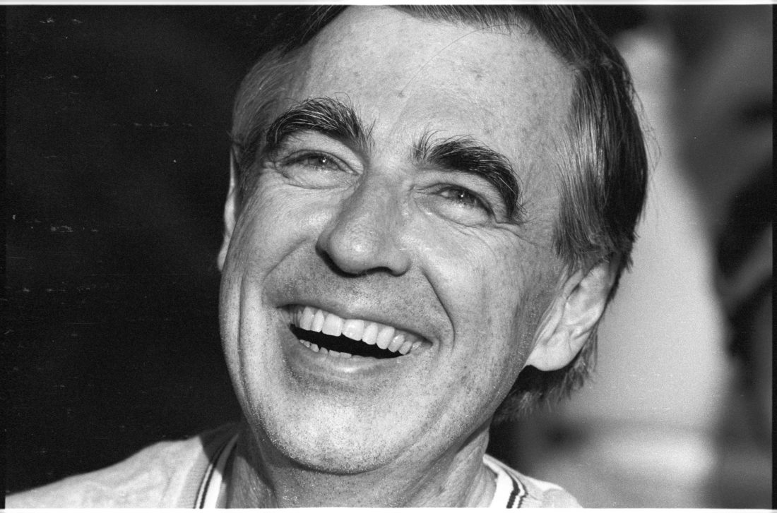 Close portrait of Fred Rogers looking into sun - StoryDriven